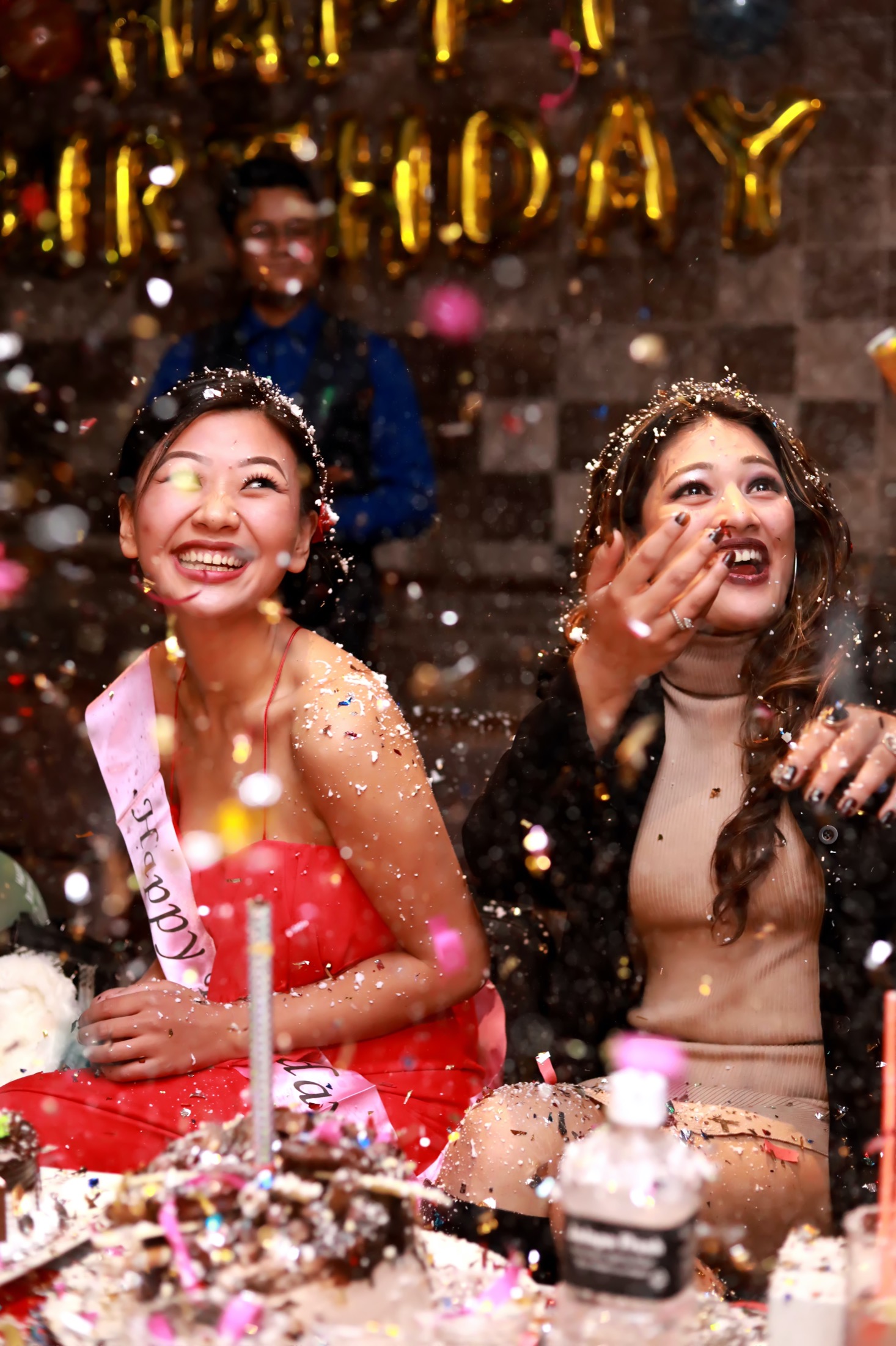 A woman celebrates her birthday with a party