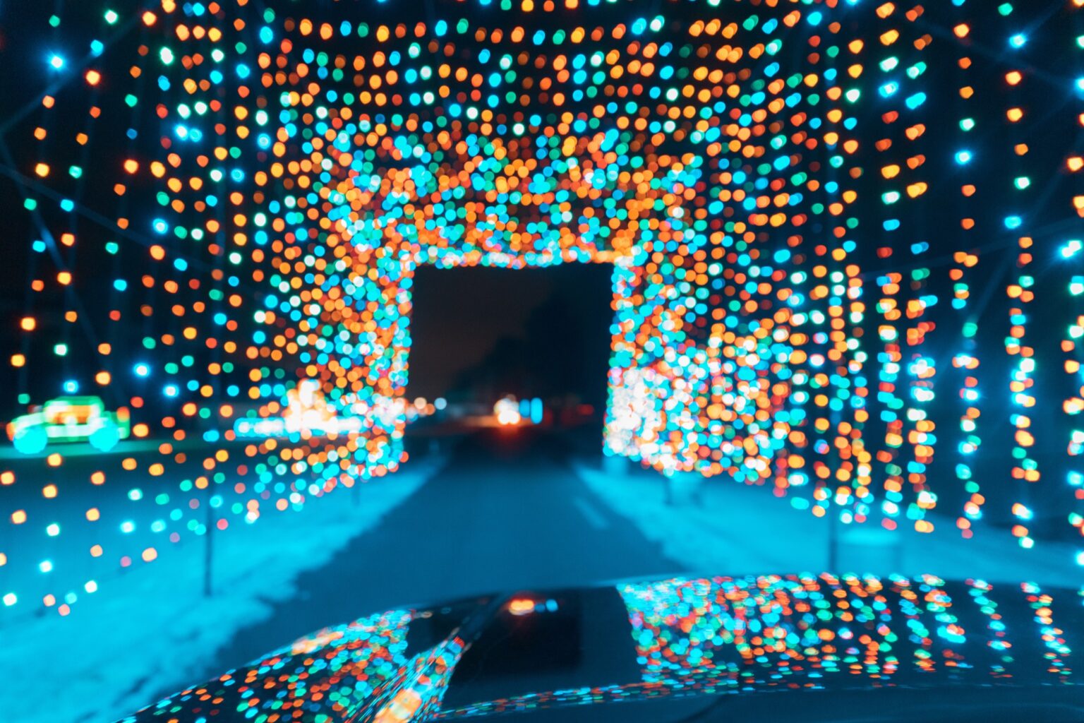 A tunnel of holiday lights to drive your car through