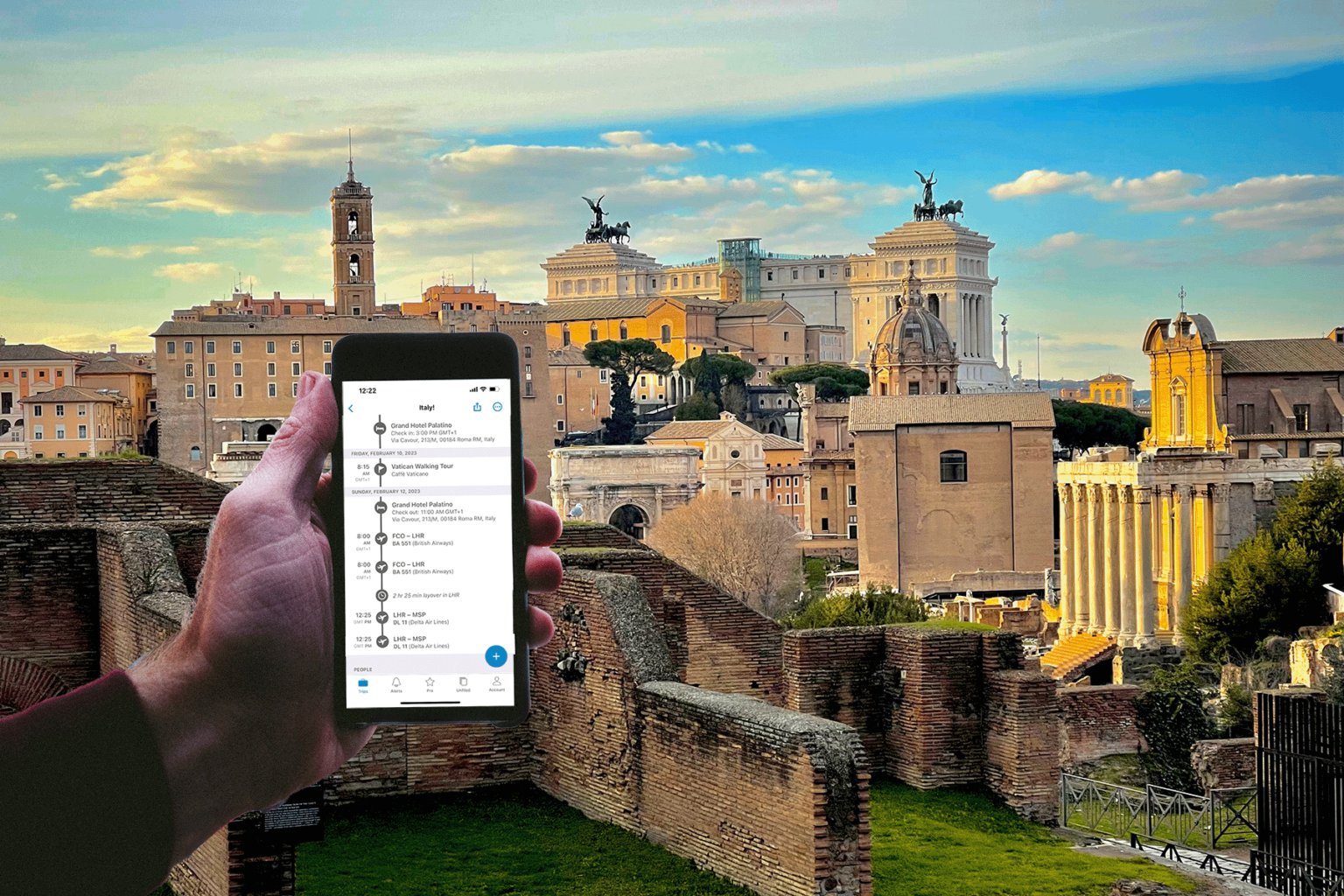 Traveller using the TripIt app to check itinerary in Rome.