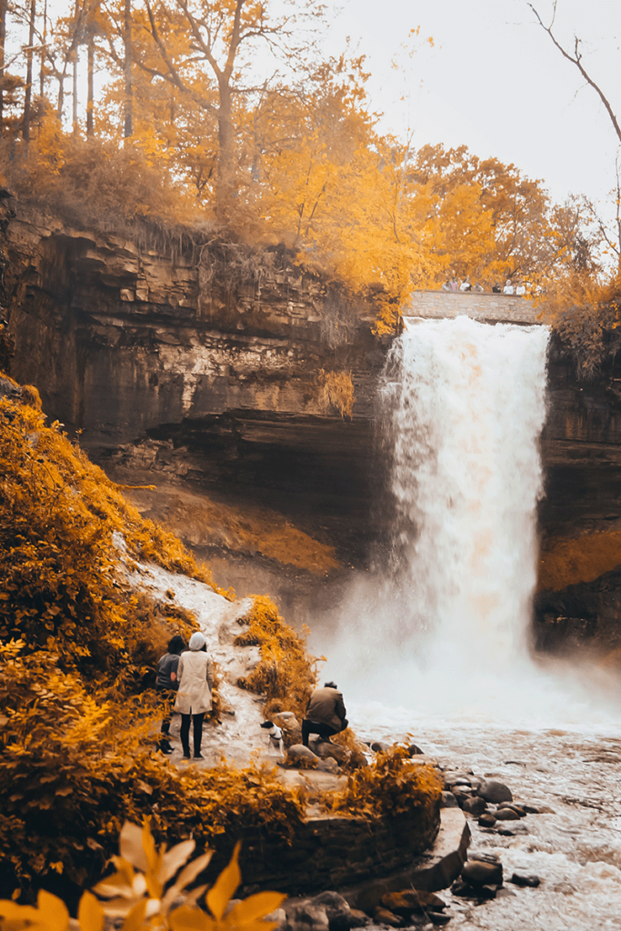 Golden colors surround the enchanting Minnehaha Falls in Minneapolis.