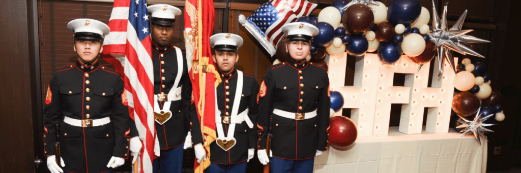 Service members stand guard and welcome the guests of honor at the Home Front Heroes Gala, an event celebrating our military spouses and awarding scholarships.