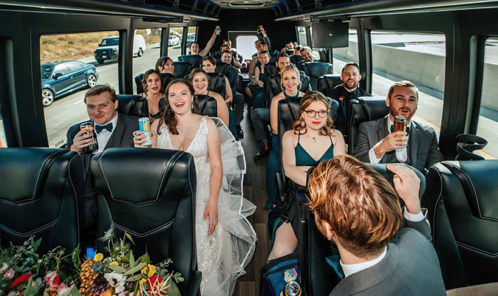 Wedding party celebrating together on Executive Transportation's Executive Mini Coach.
