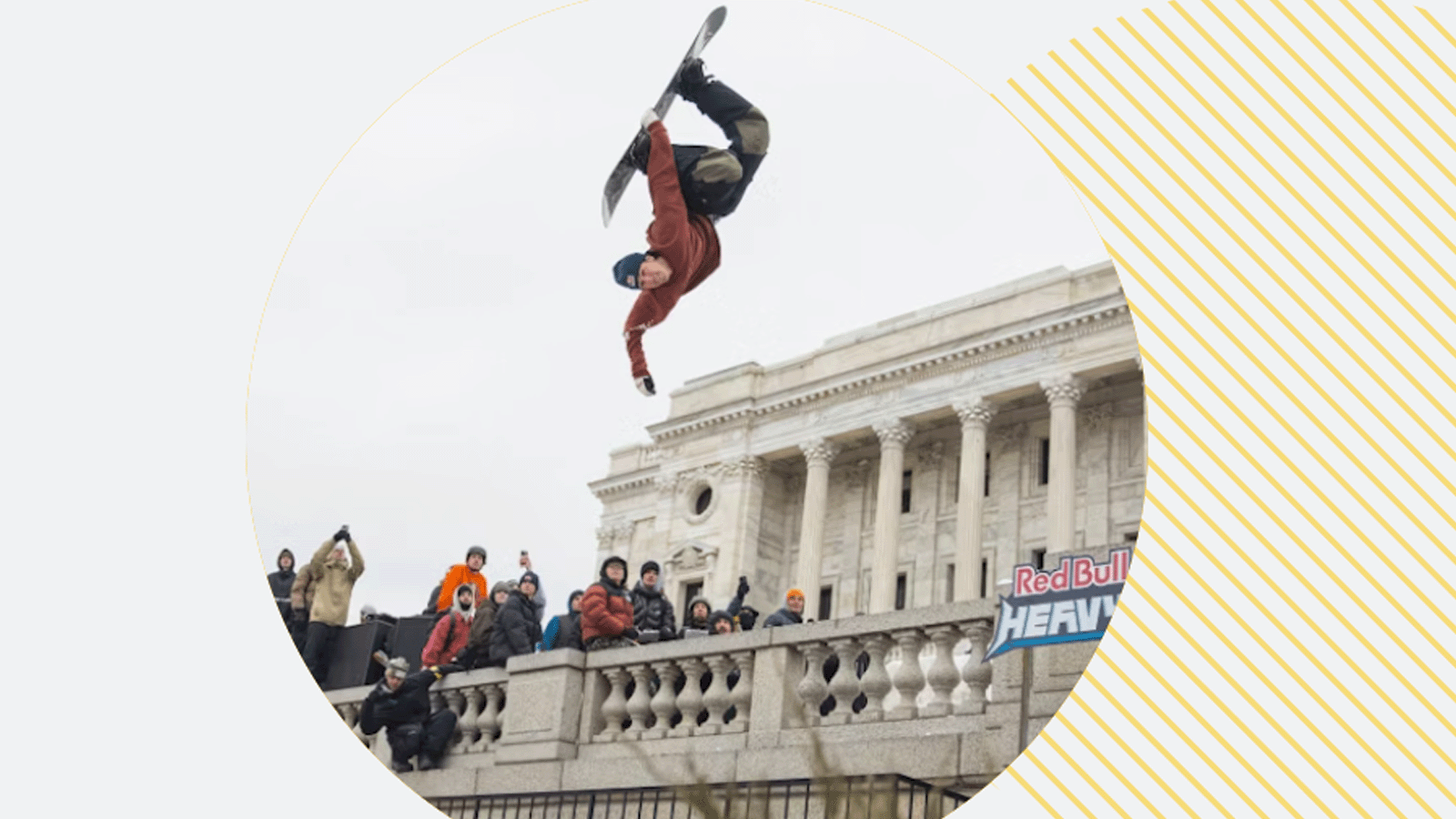 Red Bull Heavy Metal snowboarder catches air off the balcony of the State Capitol in Saint Paul Minnesota.