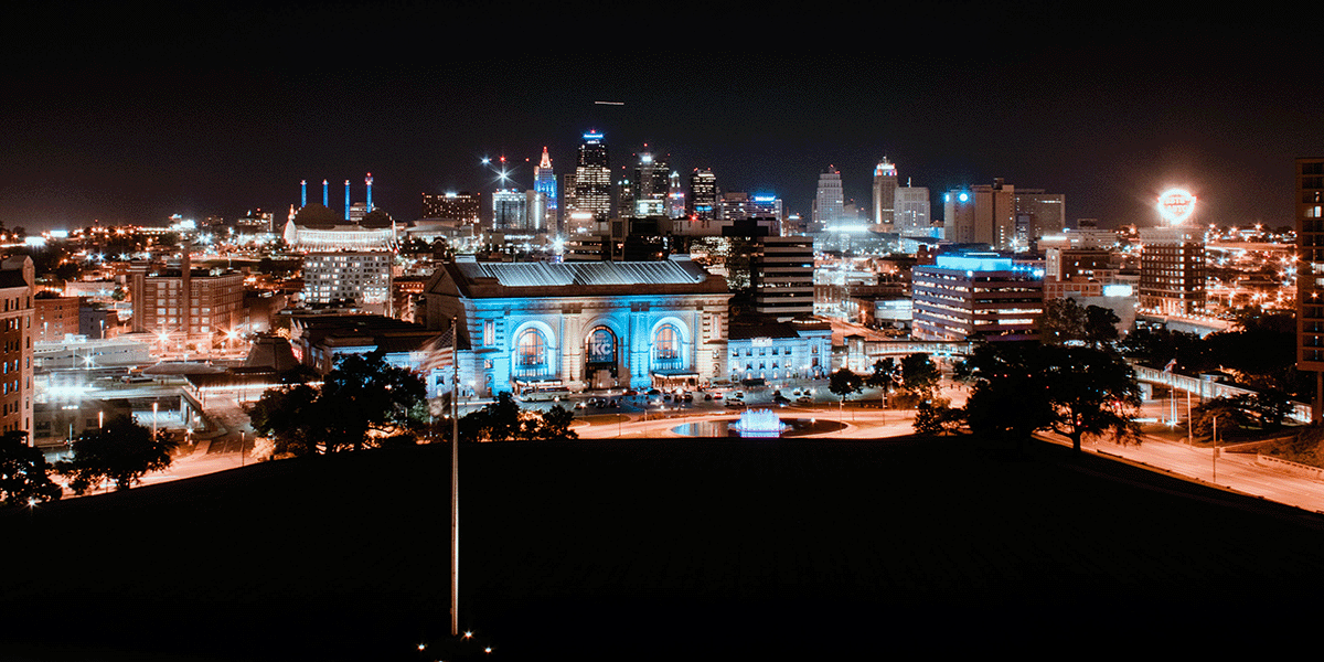 A view of the Kansas City skyline from the edge of town at night.