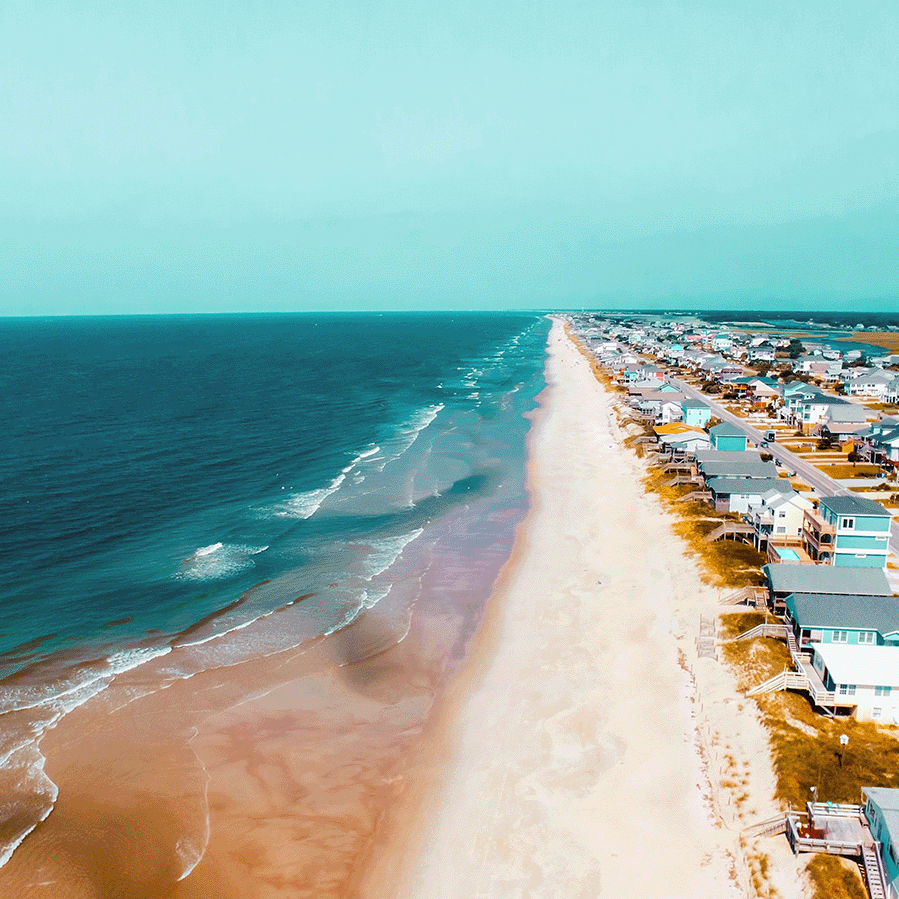Pristine sand beaches and teal waters along the North Carolina coast.