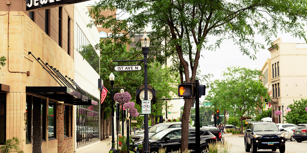 A view of the picturesque tree-lined Main Street in downtown Fargo, North Dakota.